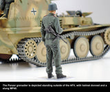 The Panzer grenadier is depicted standing outside of the AFV, with helmet donned and a slung MP40.